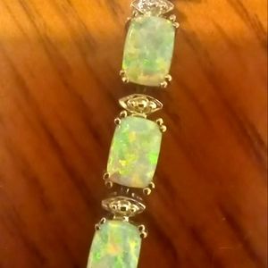 Sterling plated fire opal tennis bracelet